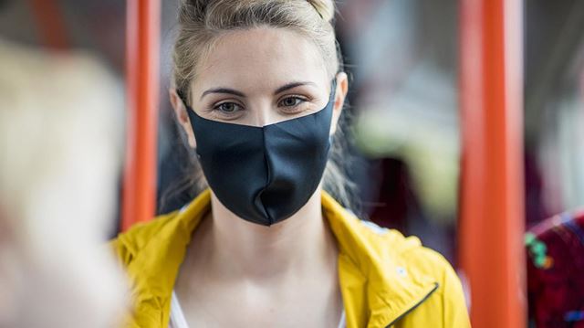 Public transport guidelines woman wearing mask